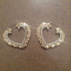 Beautiful gold heart shaped hoops with rhinestone detail